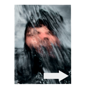 Shapers-Club- A blurred face behind a waterfall captures the excitement of surfing, with a white arrow to the right below - an evocative scene from ACID MAGAZINE - N°6 - WHATEVER SURFING MEANS. -surfshop-surfboard